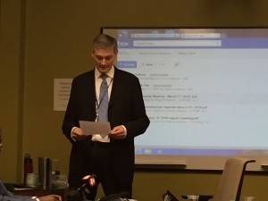 Dr. Mark Travers from Roswell Park addresses BMHA board before their Smoke-free housing vote.